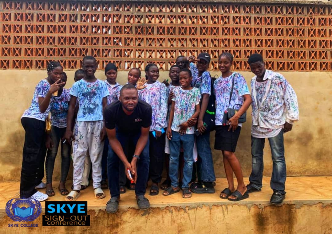 Group of diverse students smiling and studying together in modern classroom